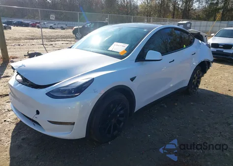 2023 Tesla Model Y Awd/Long Range Dual Motor All-Wheel Drive z USA, uszkodzony, nr VIN 7SAYGDEE5PF635160